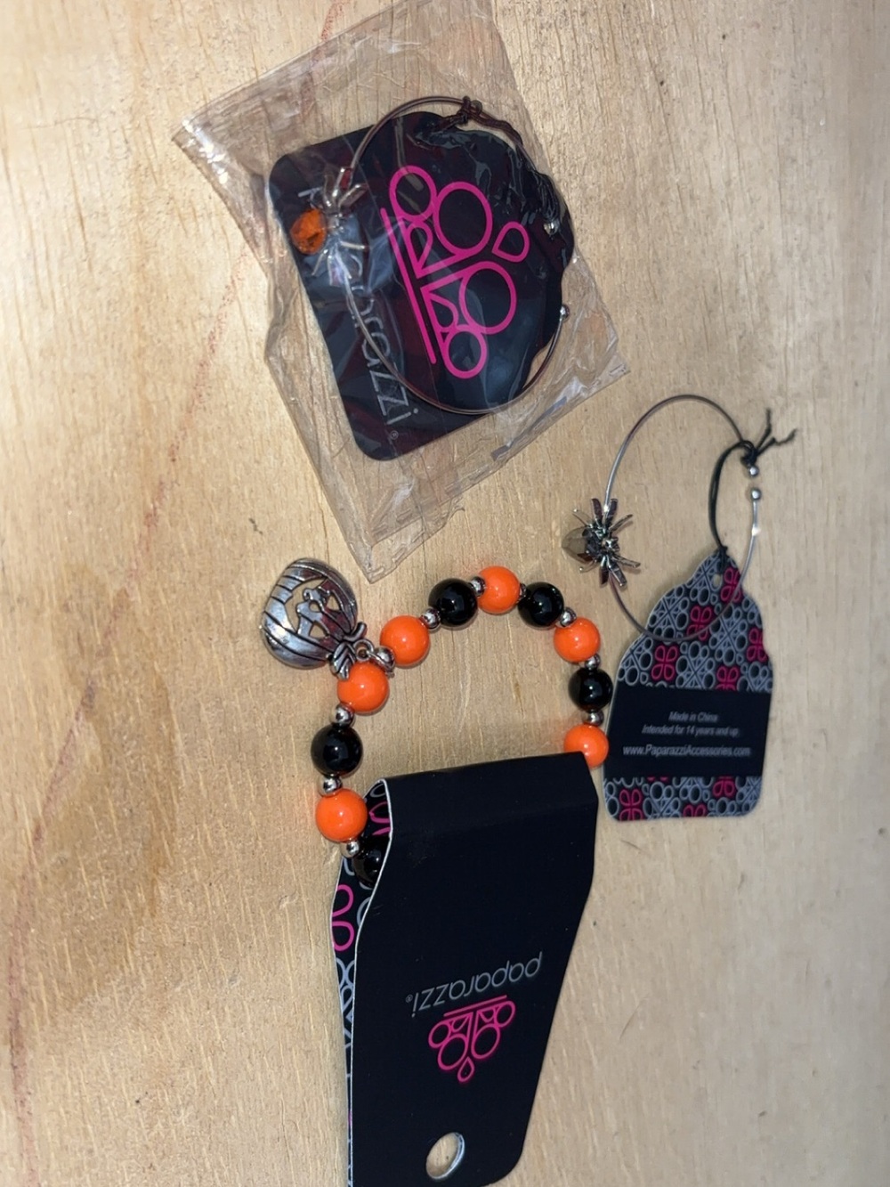 Black Faux-Fur Pom Bracelet with Skeleton Hand Charm